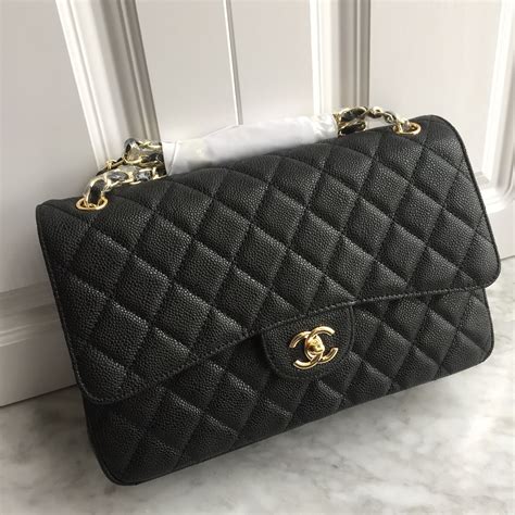 black gold chanel bag|chanel black classic flap bag.